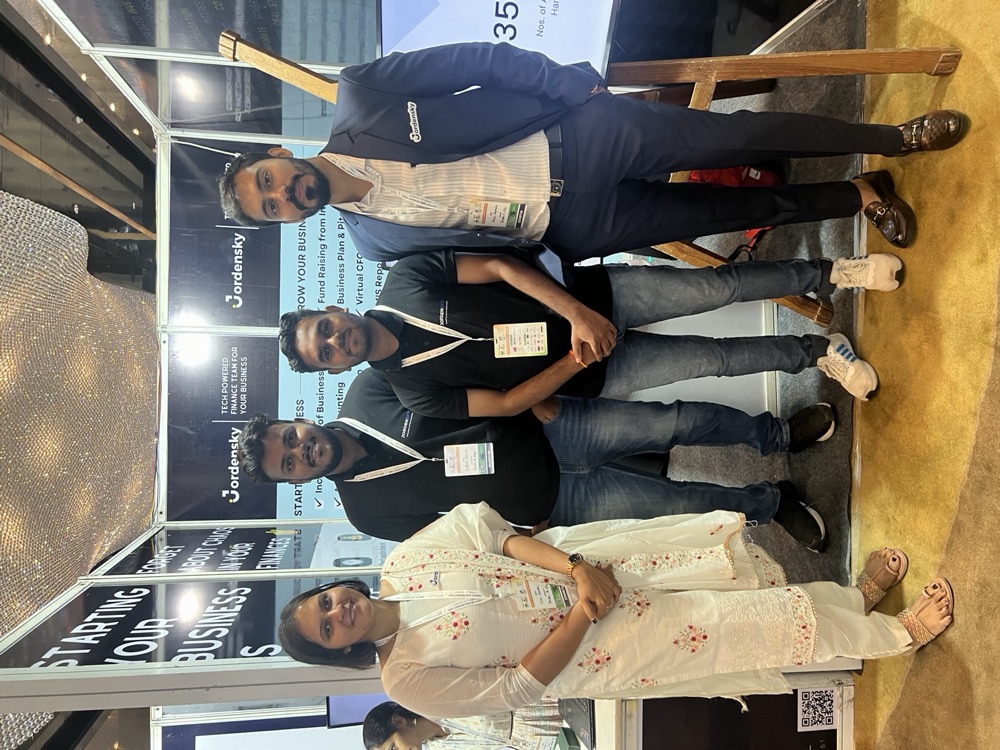 Jordensky team members meeting clients at a business event